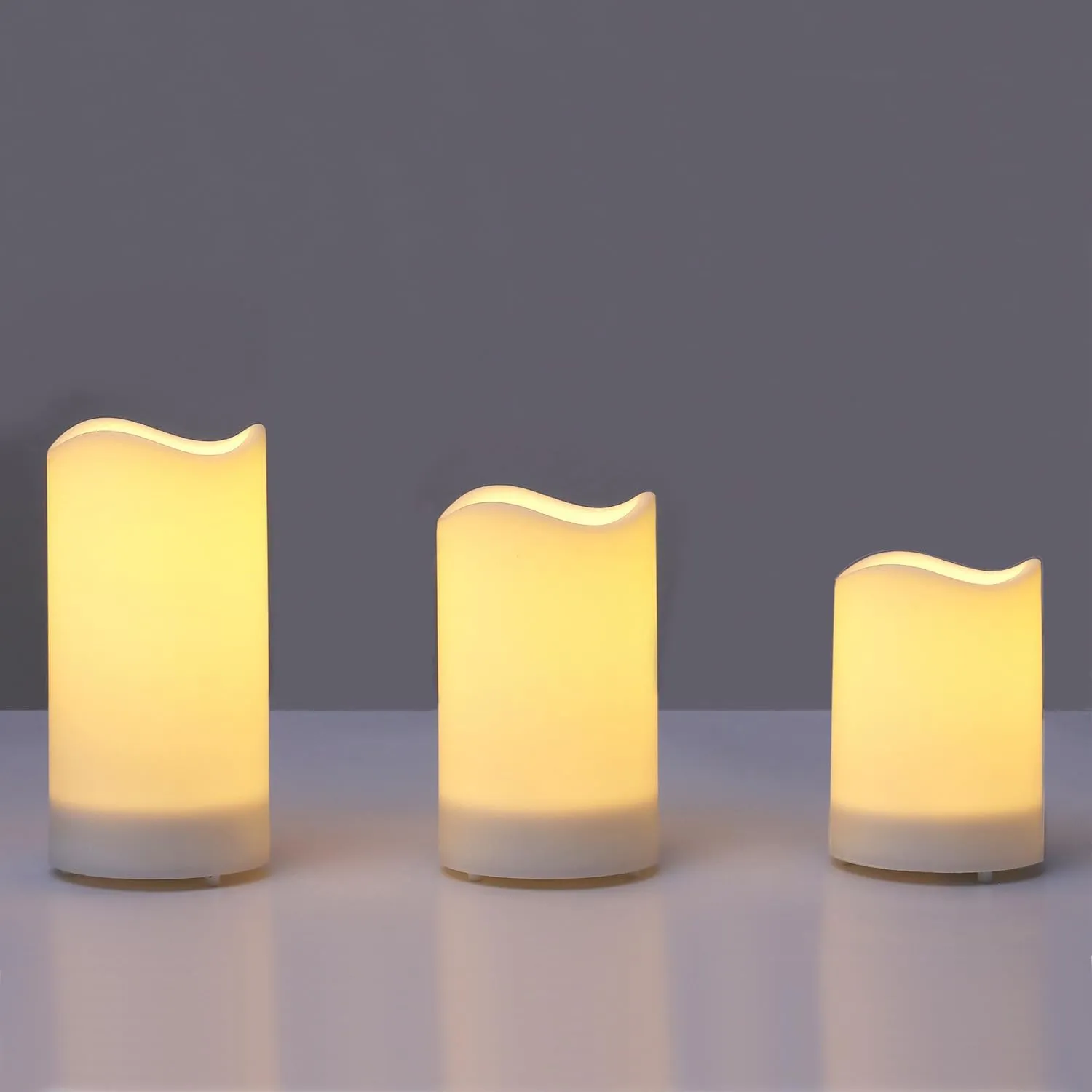 Outdoor Solar Flameless Candles 4" 5" 6" Set of 3 White Dirpless Pillars Include Realistic Flashing LED Flames and Waterproof Light Sensor Timer, Rechargeable Solar Battery Included