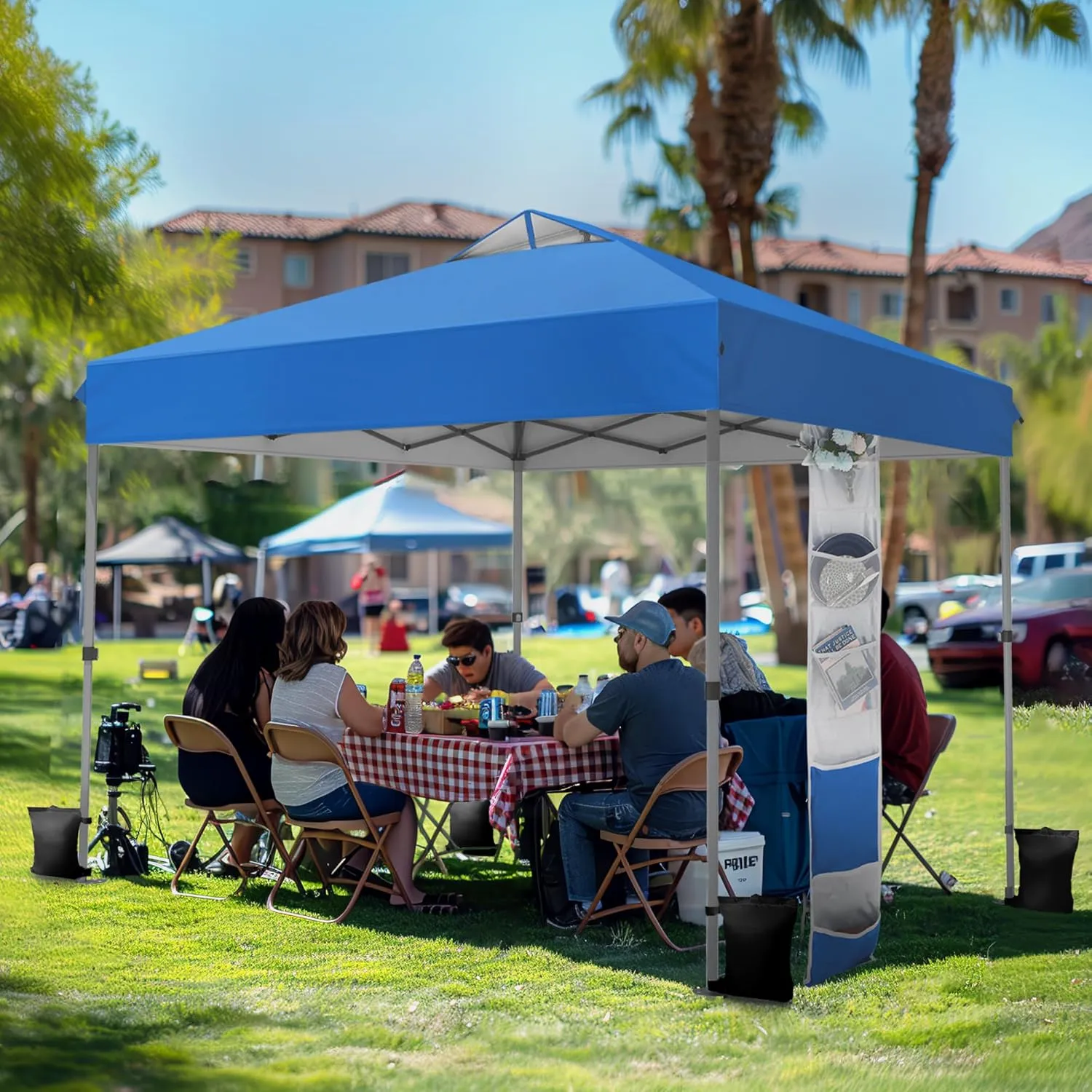 PHI VILLA 10’ x10’ Pop Up Canopy Tent - One Push Setup, Instant Shade Tent with Vented Roof for Beach & Events - Includes Storage Bag, Sandbags, Stakes & Ropes (Blue)